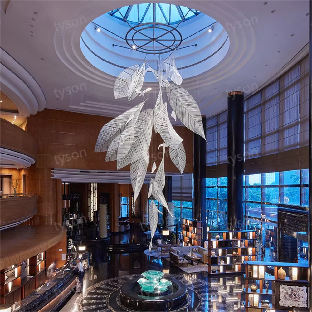 Inspired by "natural leaf veins", this chandelier features layered leaf structures made of translucent acrylic/crystal material, with delicate textures like real veins. The pendant layout mimics the natural drooping form of leaves, and light refracts soft and warm light and shadow through the material. It is both a space lighting tool and a visually striking art installation, infusing high-end venues with a natural and elegant artistic style.