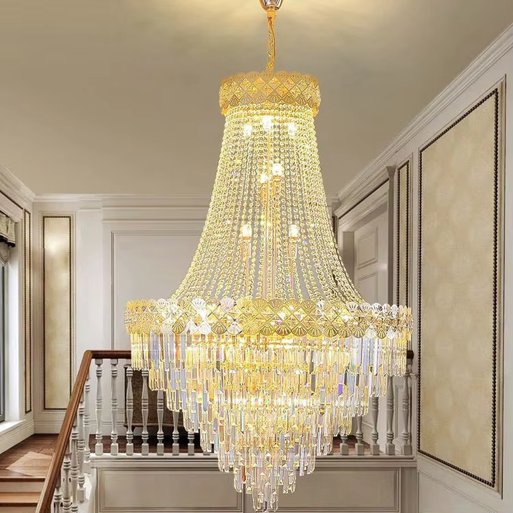 Top-luxury golden frame multi-layer crystal high-ceiling chandelier, tower-shaped gradient design + full crystal strings + carved decorations, brilliant warm light creates noble luxurious atmosphere.