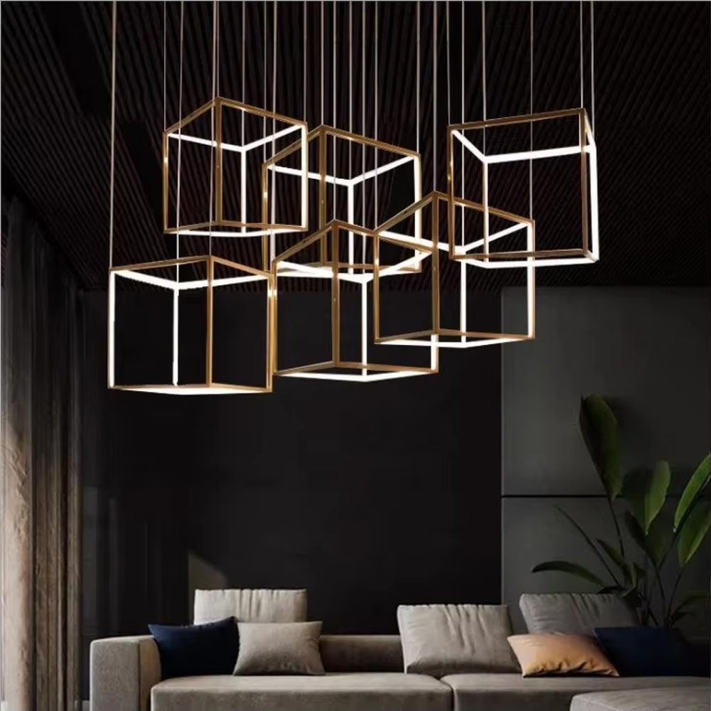 This light luxury minimalist cube chandelier features a gold metal frame with an embedded light-transmitting grid lampshade, using a floating suspension design, with a simple and exquisite shape, serving both lighting and decorative purposes, ideal for dining rooms, living rooms, modern light luxury homes and other scenarios.