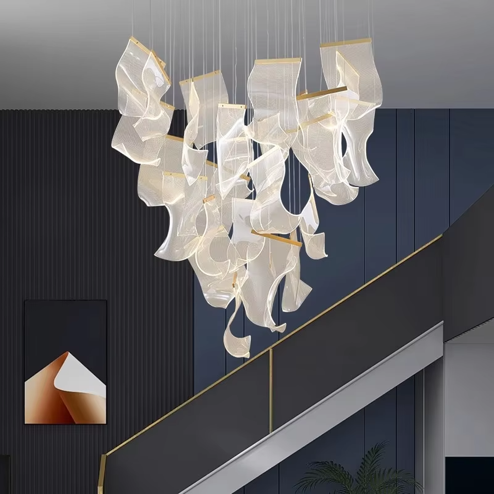 This is a modern artistic suspended chandelier, featuring an irregular clustered shape crafted from translucent pleated material, as light and dreamy as a cloud. It emits soft and gentle light, serving both lighting and artistic decoration purposes, suitable for villa high-ceiling living rooms, duplex voids, high-end clubs, art exhibition halls and other spaces.