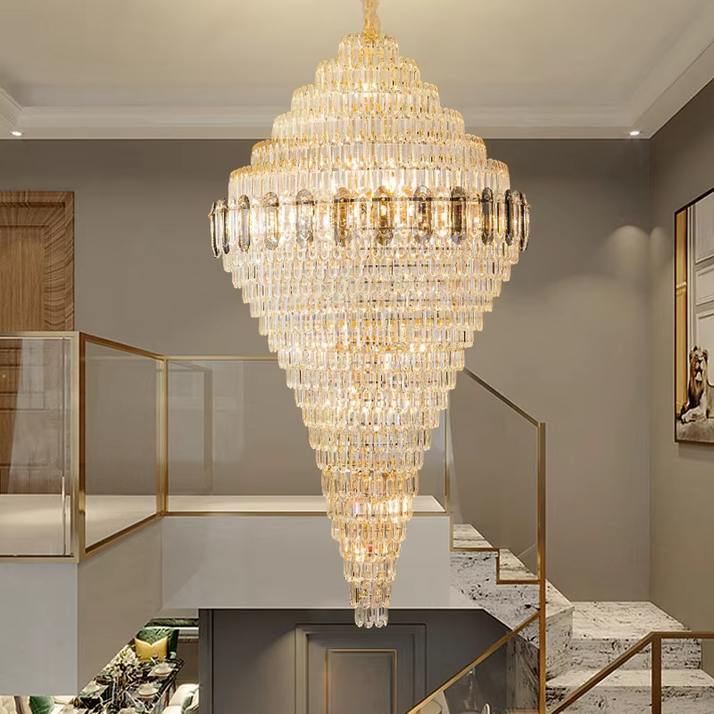 This is an European-style luxurious teardrop-shaped crystal chandelier, featuring a pyramid shape crafted from multi-layer dense crystal strips, emitting brilliant and gorgeous light, serving both lighting and decorative purposes, suitable for villa high-ceiling living rooms, hotel lobbies, banquet halls, high-end clubs and other scenarios.
