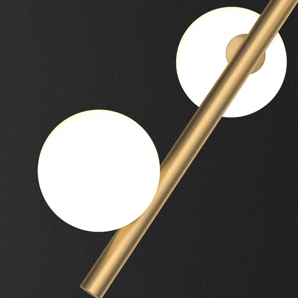 Nordic light luxury style staggered spherical chandelier, with gold metal suspension rods paired with milky white luminous bulbs, arranged in a cascading staggered layout. It emits soft and warm light, combining decorativeness and lighting function, suitable for core lighting and atmosphere creation in high-ceiling spaces such as duplex stairs, high-ceiling living rooms, and villa hollow areas.
