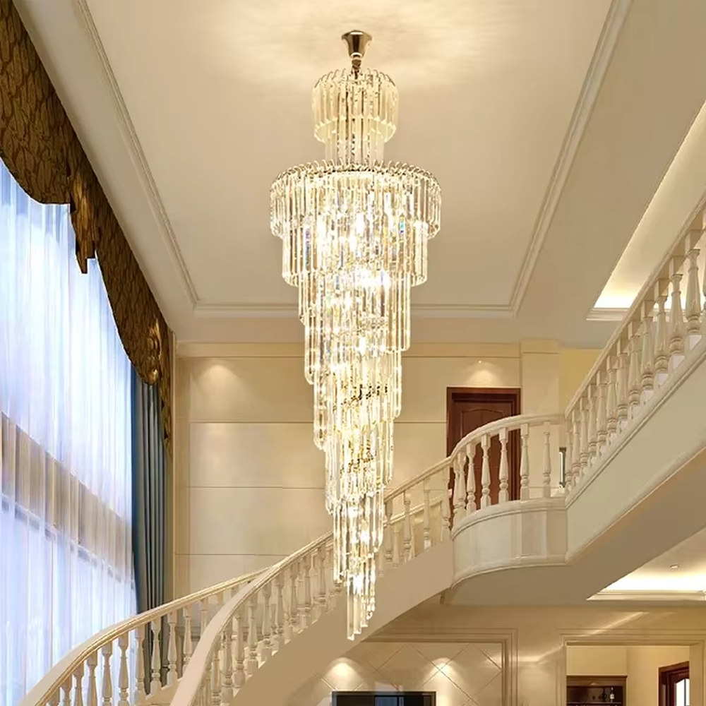 This is an European-style luxurious long cone-shaped crystal chandelier, featuring a pagoda-style structure crafted from multi-layer dense crystal strips, emitting brilliant and gorgeous light, serving both lighting and decorative purposes, suitable for villa high-ceiling staircases, duplex void living rooms, hotel lobbies and other scenarios.