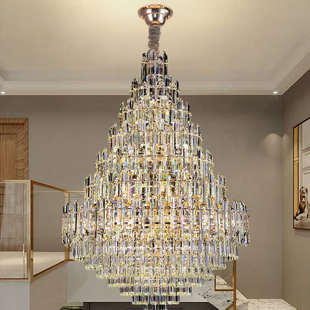 This is an European-style luxurious teardrop-shaped crystal chandelier, featuring a pyramid shape crafted from multi-layer dense crystal strips, emitting brilliant and gorgeous light, serving both lighting and decorative purposes, suitable for villa high-ceiling living rooms, hotel lobbies, banquet halls, high-end clubs and other scenarios.
