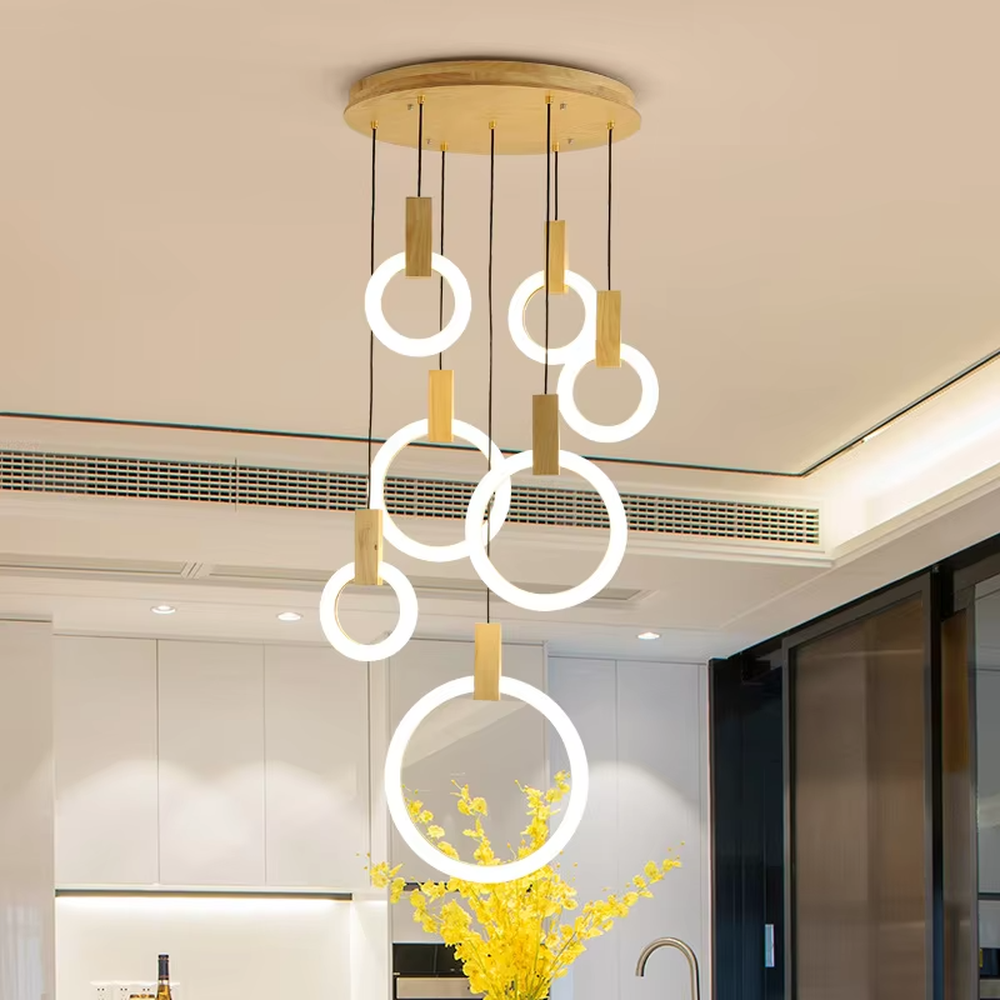 Minimalist ring tiered chandelier (gold accessory + white ring + warm light), warm light effect, creating a modern and high-end space atmosphere.
