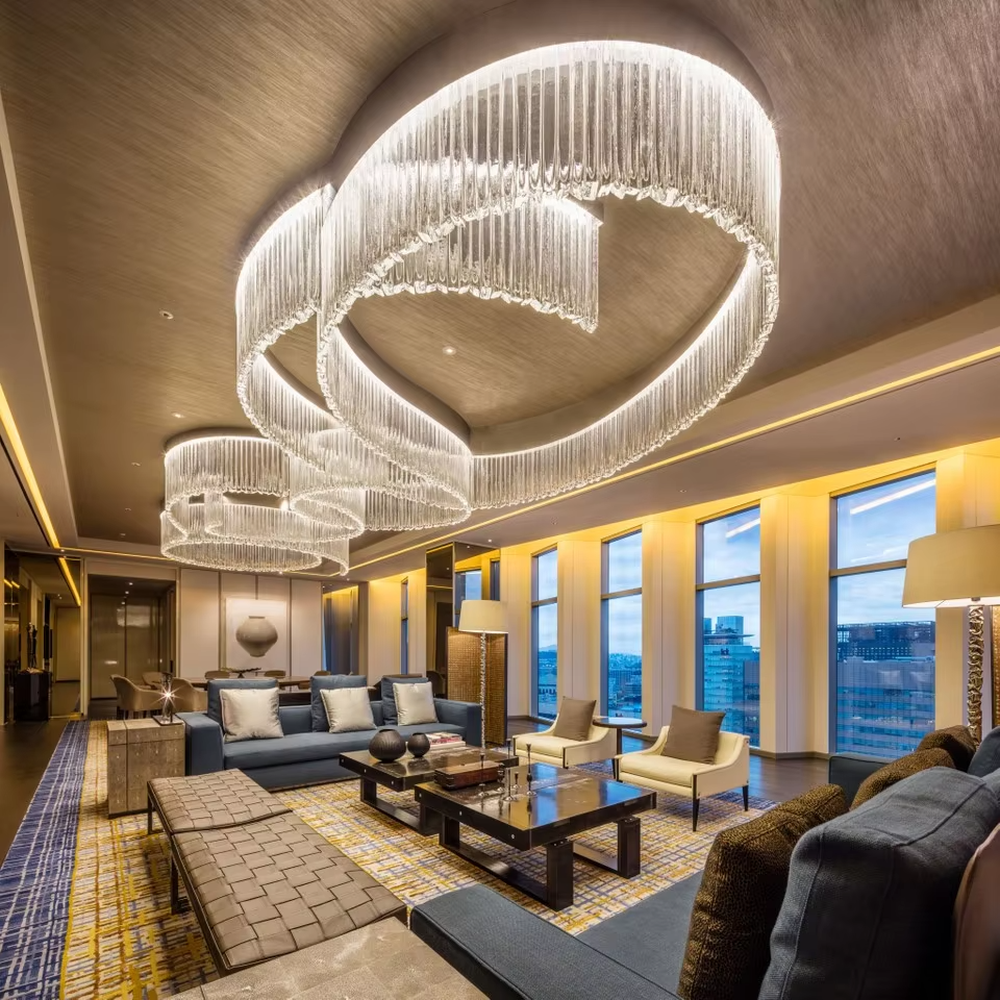 Light luxury ring gradient crystal strip engineering chandelier, transparent crystal strips hanging to create a multi-layer nested ring shape, with transparent and brilliant light, designed to enhance the luxurious atmosphere of high-end spaces, suitable for high-ceiling engineering scenarios such as hotel lobbies, club reception halls, and high-end showrooms