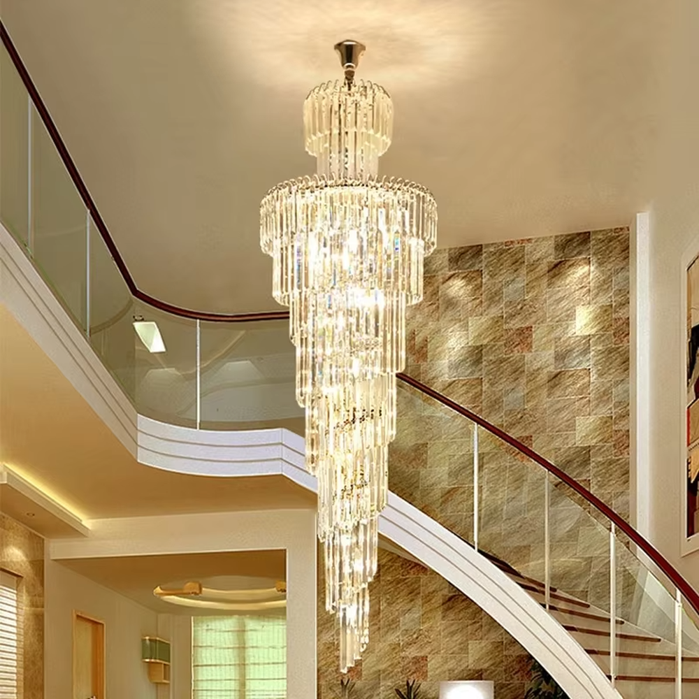This is an European-style luxurious long cone-shaped crystal chandelier, featuring a pagoda-style structure crafted from multi-layer dense crystal strips, emitting brilliant and gorgeous light, serving both lighting and decorative purposes, suitable for villa high-ceiling staircases, duplex void living rooms, hotel lobbies and other scenarios.