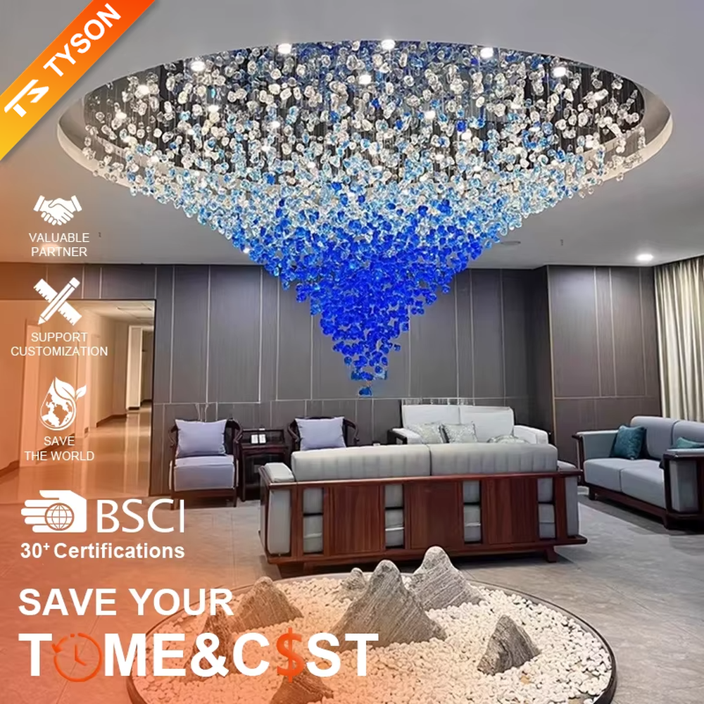 Luxury blue-white crystal column chandelier (gradient color crystals + hanging shape), warm light effect, creating a brilliant and elegant high-end space atmosphere.