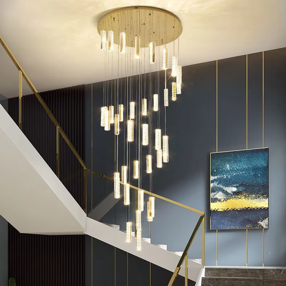 Modern light luxury crystal cylindrical multi-head cascading chandelier, with multiple groups of luminous crystal cylindrical lamp heads hanging staggered, emitting soft and transparent light, combining artistic decorativeness and lighting function, suitable for core lighting and atmosphere creation in high-ceiling spaces such as duplex stairs, villa hollow areas, and high-ceiling living rooms.