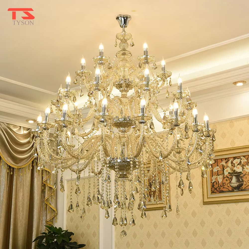 European palace-style luxury multi-layer crystal chandelier, featuring a gold-plated metal frame paired with transparent crystal pendants and candlestick-shaped lamp heads. It emits brilliant and dazzling light, combining artistic decorativeness and lighting function, suitable for core decoration and main lighting in large high-end spaces such as villa living rooms, hotel lobbies, and banquet halls.