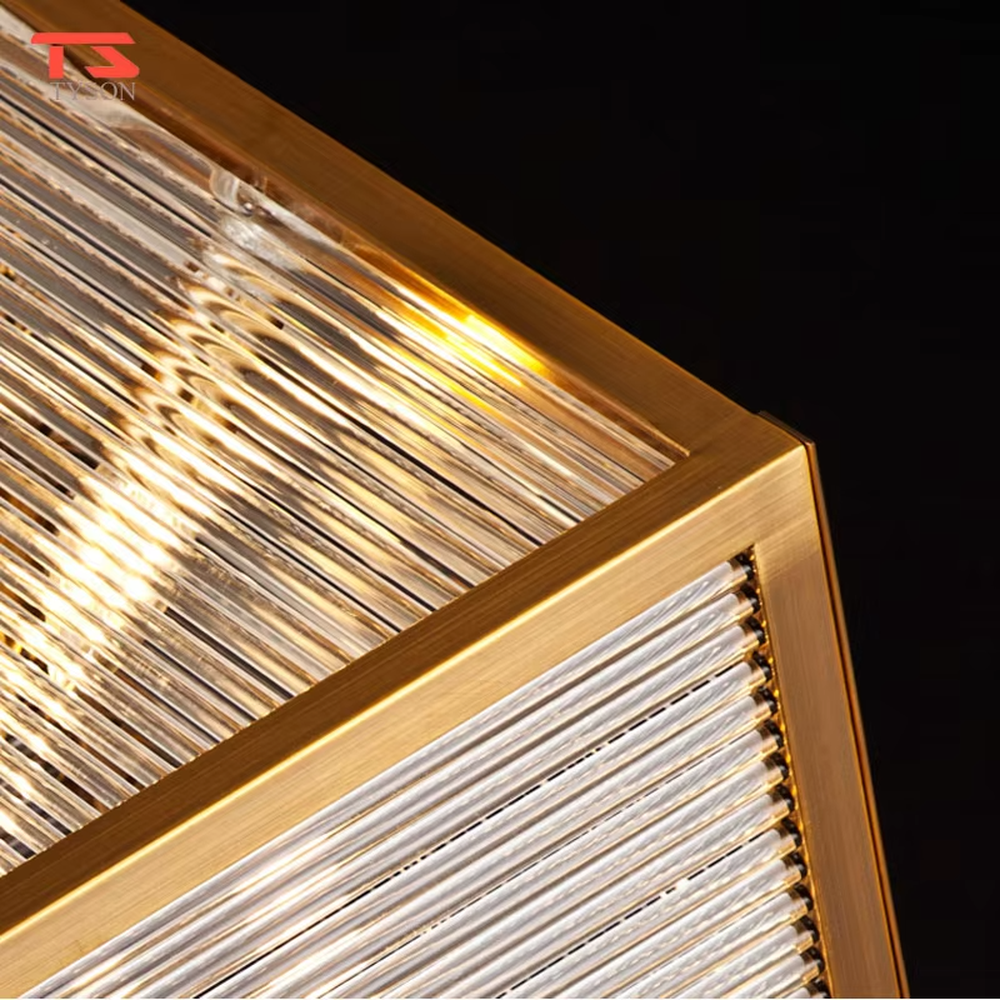 This light luxury minimalist cube chandelier features a gold metal frame with an embedded light-transmitting grid lampshade, using a floating suspension design, with a simple and exquisite shape, serving both lighting and decorative purposes, ideal for dining rooms, living rooms, modern light luxury homes and other scenarios.