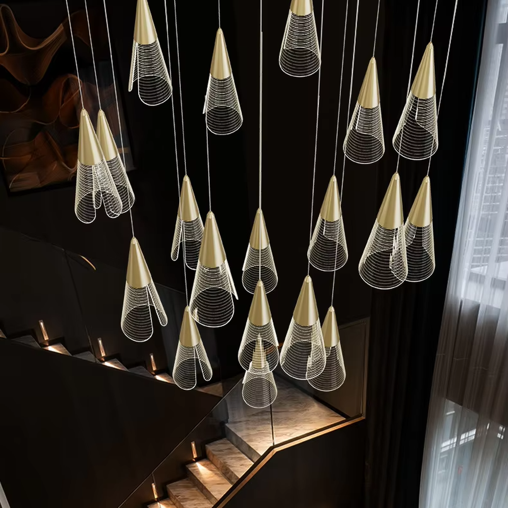 This is a modern minimalist staggered cone mesh chandelier, featuring a black metal base paired with multiple hollow mesh cone lampshades. It emits soft and transparent light, serving both lighting and decorative purposes, suitable for duplex staircases, light luxury living rooms, dining rooms, bars and other scenarios.