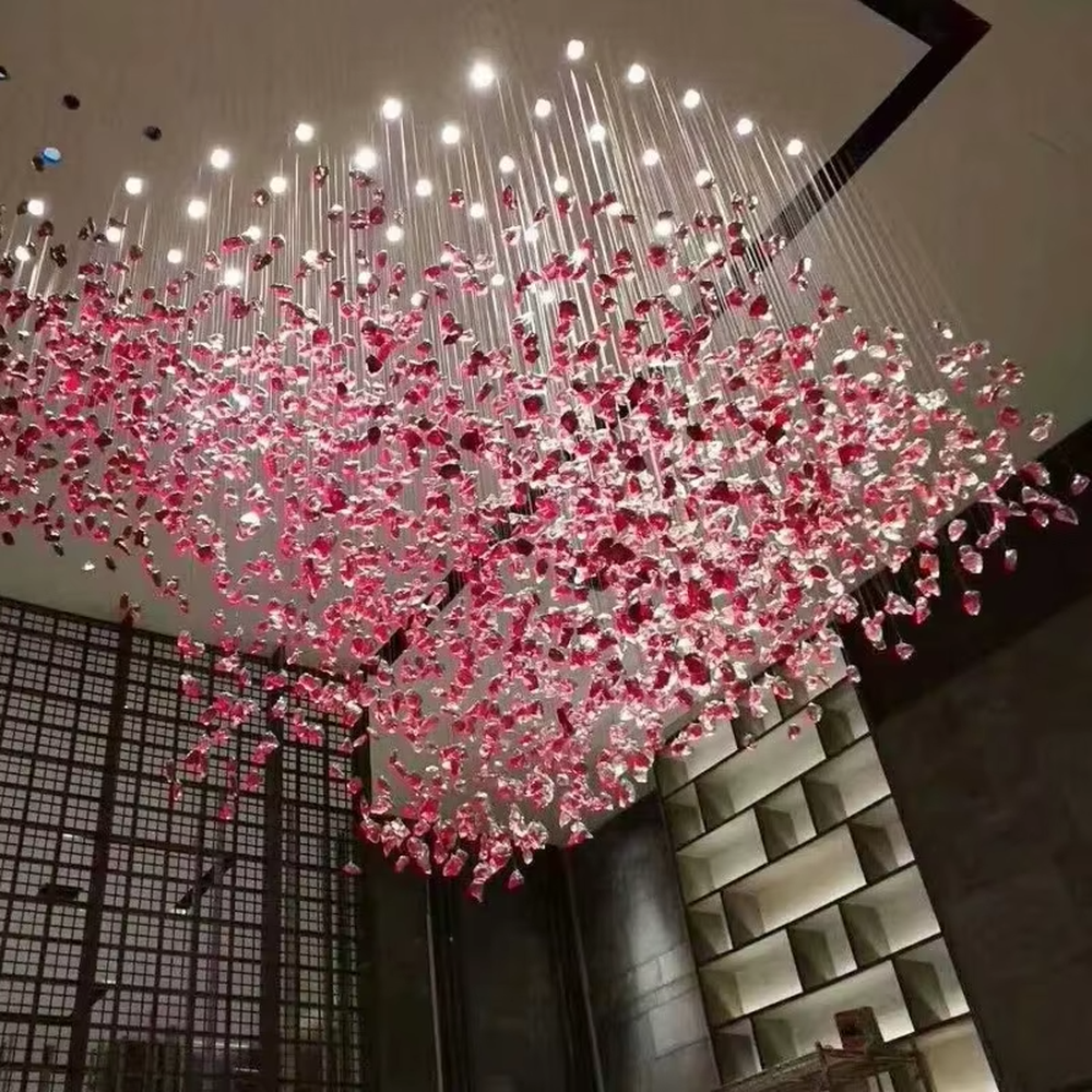 Art pink crystal cluster chandelier (hanging crystals + warm light), warm light effect, creating a romantic and brilliant atmosphere for high-end public spaces.