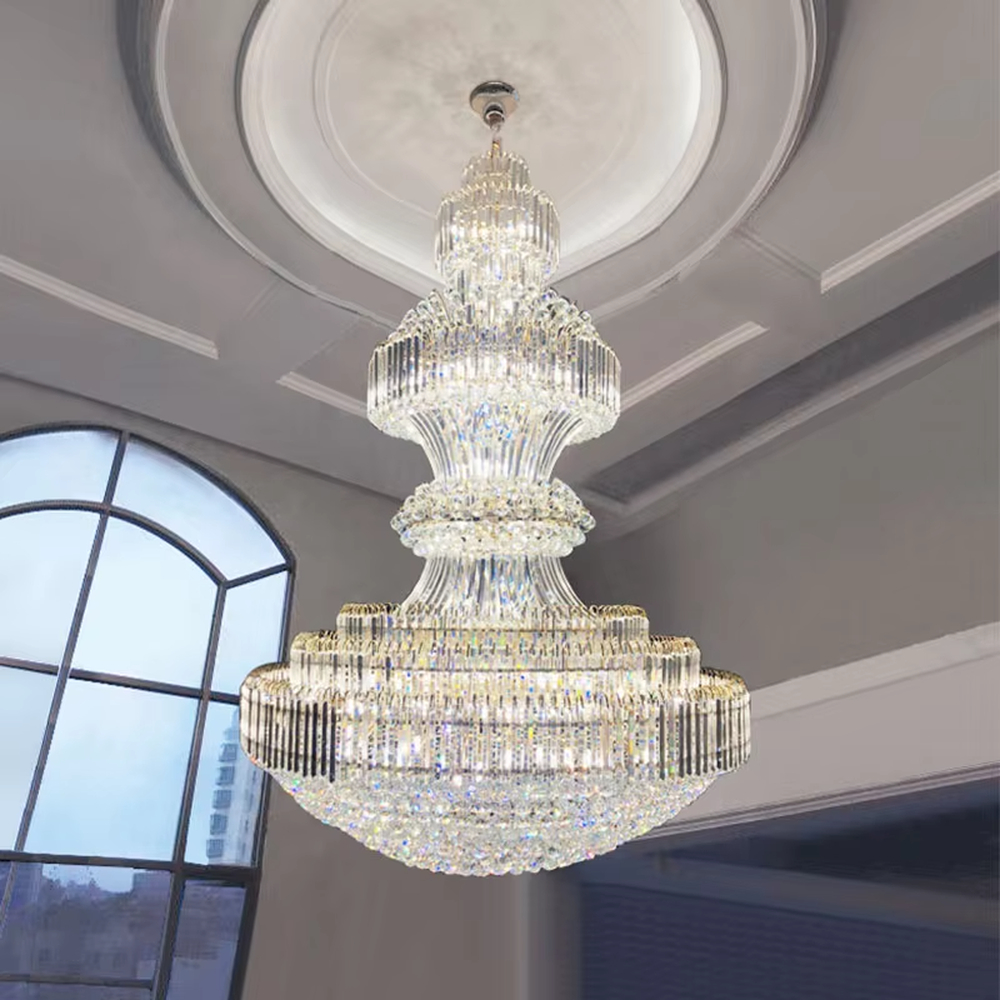 Multi-tiered golden crystal chandelier, with cascading crystal pendants and a gold metal frame, providing brilliant and luxurious light, designed to create a high-end and grand space atmosphere, suitable for engineering scenarios such as hotel lobbies, high-ceiling villa living rooms, and large banquet halls