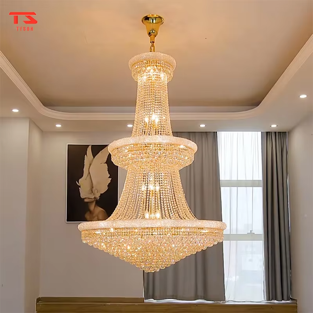Multi-tiered tower-shaped golden crystal chandelier, with multi-layer dense crystal pendants and gold metal frames, providing brilliant and luxurious light, designed to create a high-end and grand space atmosphere, suitable for high-ceiling engineering scenarios such as villa high-ceiling living rooms, duplex buildings, hotel lobbies, and clubs