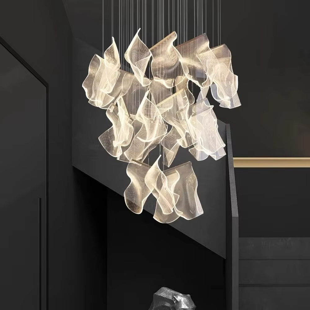 This is a modern artistic suspended chandelier, featuring an irregular clustered shape crafted from translucent pleated material, as light and dreamy as a cloud. It emits soft and gentle light, serving both lighting and artistic decoration purposes, suitable for villa high-ceiling living rooms, duplex voids, high-end clubs, art exhibition halls and other spaces.