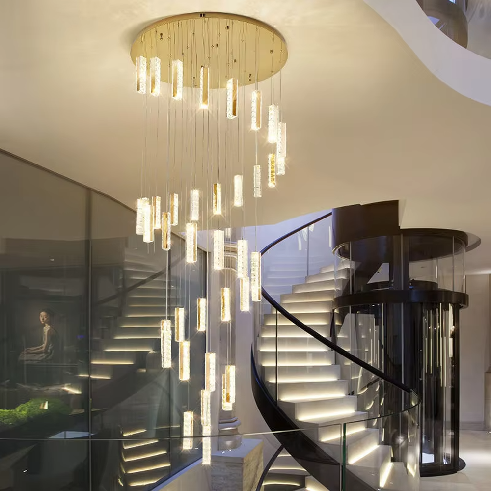 Modern light luxury crystal cylindrical multi-head cascading chandelier, with multiple groups of luminous crystal cylindrical lamp heads hanging staggered, emitting soft and transparent light, combining artistic decorativeness and lighting function, suitable for core lighting and atmosphere creation in high-ceiling spaces such as duplex stairs, villa hollow areas, and high-ceiling living rooms.