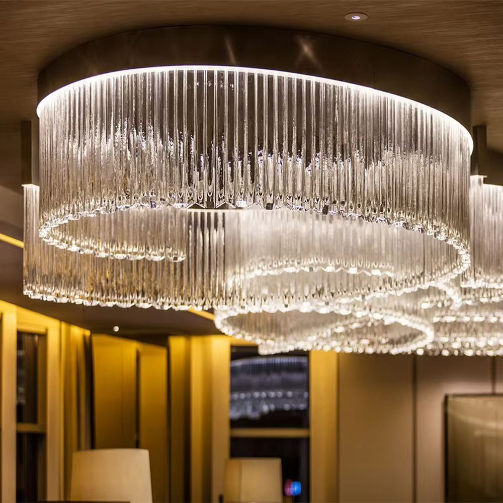 Light luxury ring gradient crystal strip engineering chandelier, transparent crystal strips hanging to create a multi-layer nested ring shape, with transparent and brilliant light, designed to enhance the luxurious atmosphere of high-end spaces, suitable for high-ceiling engineering scenarios such as hotel lobbies, club reception halls, and high-end showrooms