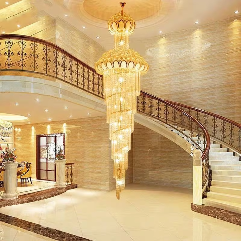 Multi-tiered lotus-top golden crystal chandelier, gold metal frame with dense crystal strips hanging to create a tower structure, lotus-shaped top, brilliant and luxurious light, designed to create a high-end atmosphere in high-ceiling spaces, suitable for engineering scenarios such as villa duplexes, hotel lobbies, and club atriums