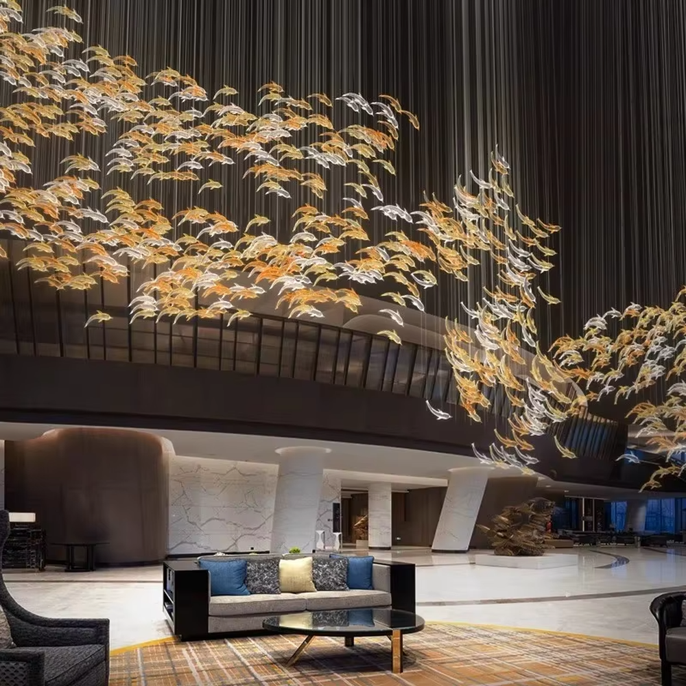 Art bird-shaped chandelier (gold-white gradient birds + warm light), warm light effect, creating a dynamic and natural atmosphere for high-end public spaces.