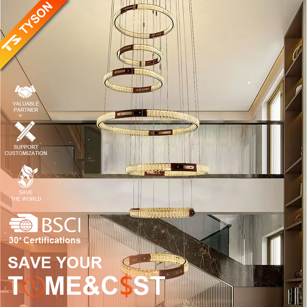 This is a light luxury style multi-layer staggered ring crystal chandelier, featuring a gold metal frame paired with transparent crystal strips. The layered ring shape resembles flowing light rhythm, emitting brilliant and luxurious light, serving both lighting and artistic decoration purposes, suitable for high-ceiling spaces such as villa high-ceiling living rooms, spiral staircases, hotel lobbies, and duplex voids.