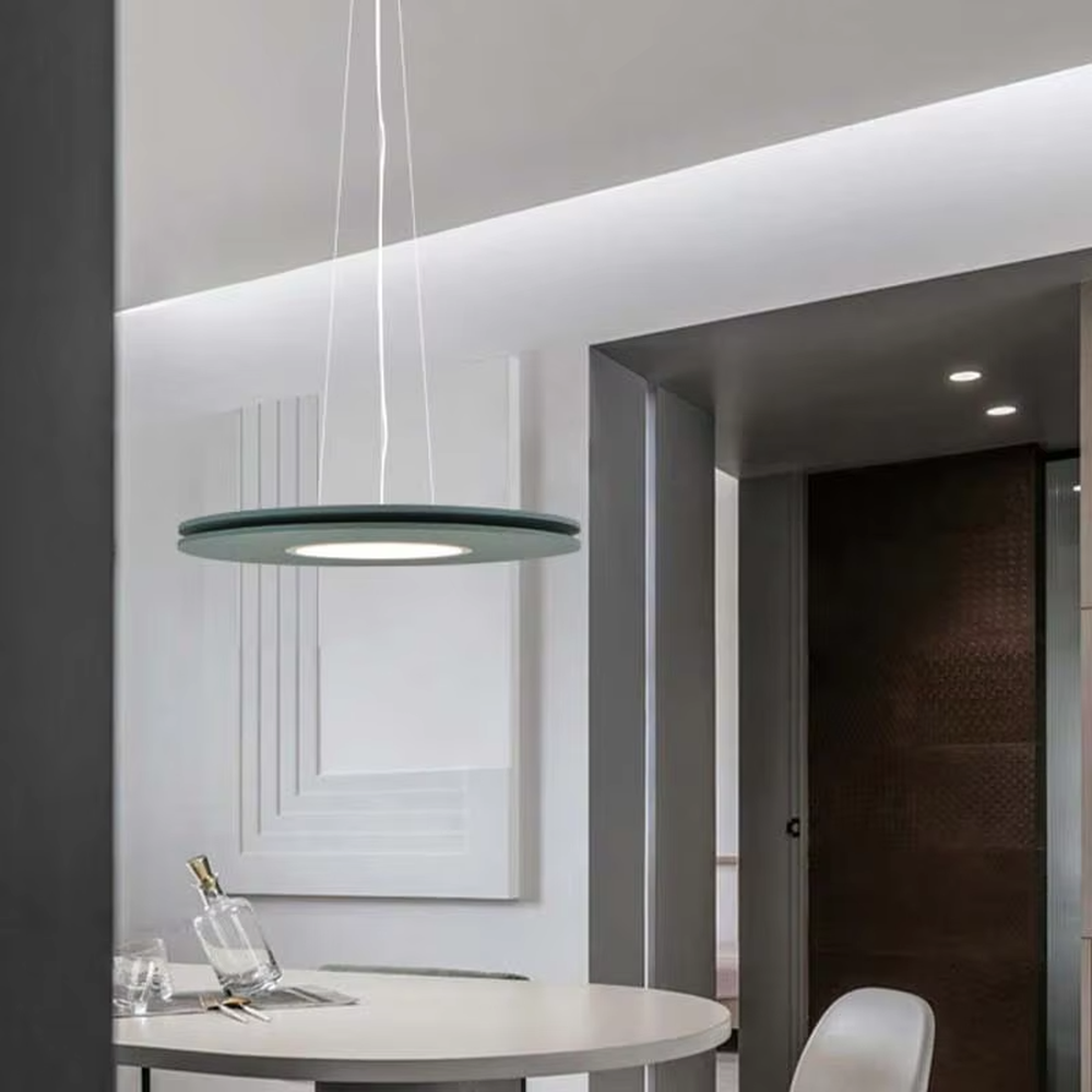 This is a modern minimalist green circular chandelier, with a single-layer circular shape, featuring a minimalist and grand design, modern and fresh style. It is used for space lighting and decoration, creating a minimalist modern and fresh atmosphere. It is suitable for modern minimalist restaurants, Nordic-style home living rooms, art studios and other places.