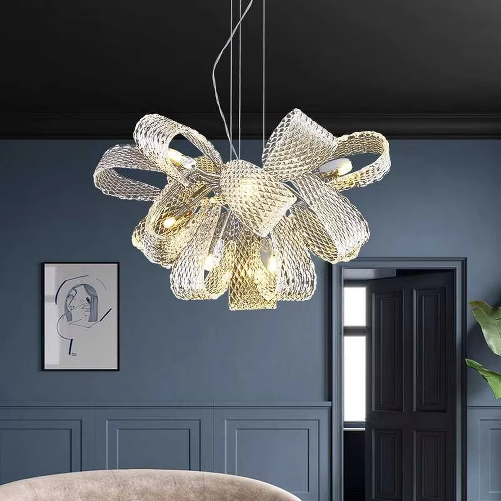 Modern art light luxury woven bow-shaped transparent texture chandelier, golden textured woven pattern + warm light effect, creating a flexible luxurious artistic atmosphere.