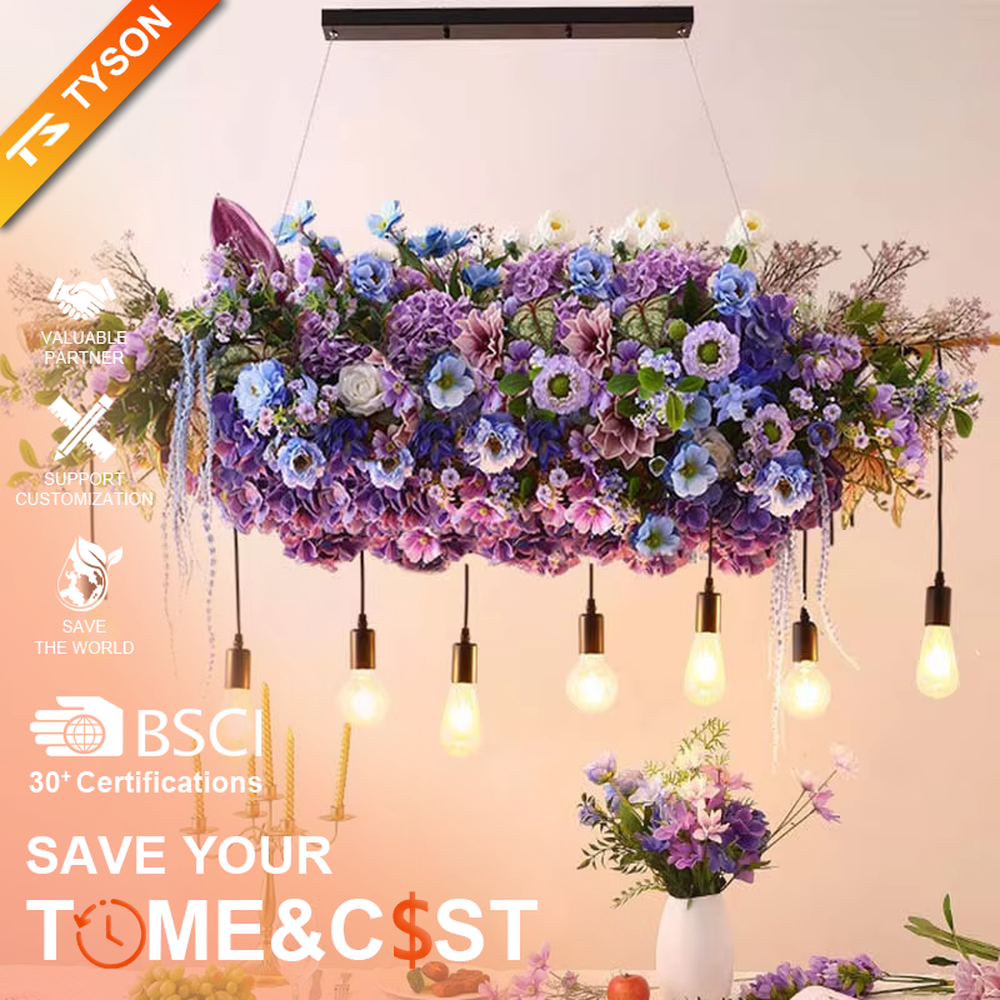 This is a romantic natural-style long strip floral retro chandelier, with blue and white artificial flowers (hydrangeas, orchids, etc.) and green plants as the main decoration, paired with retro bulbs. It has a fresh and romantic style, with warm and soft lighting.