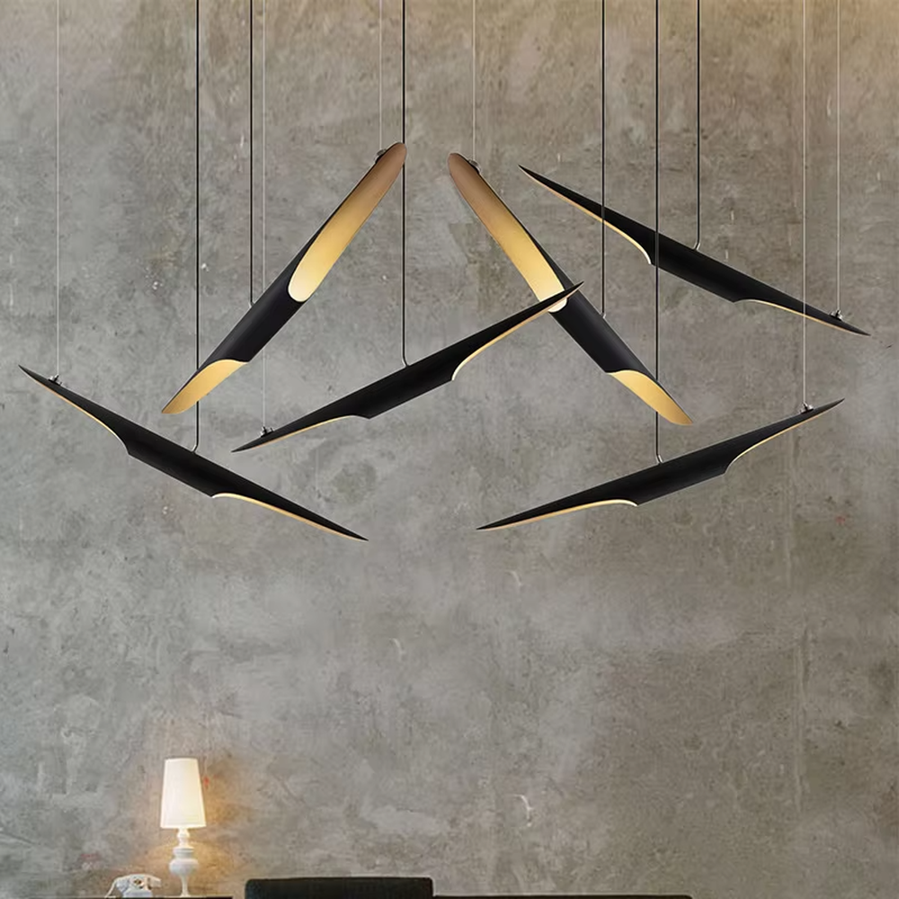 This modern minimalist wing-shaped chandelier features a black metal body with warm light LED strips embedded in the edges, hung in a scattered bird-like shape. It serves both lighting and decorative purposes, ideal for high-ceiling living rooms, light luxury restaurants, high-end office spaces and other scenarios.