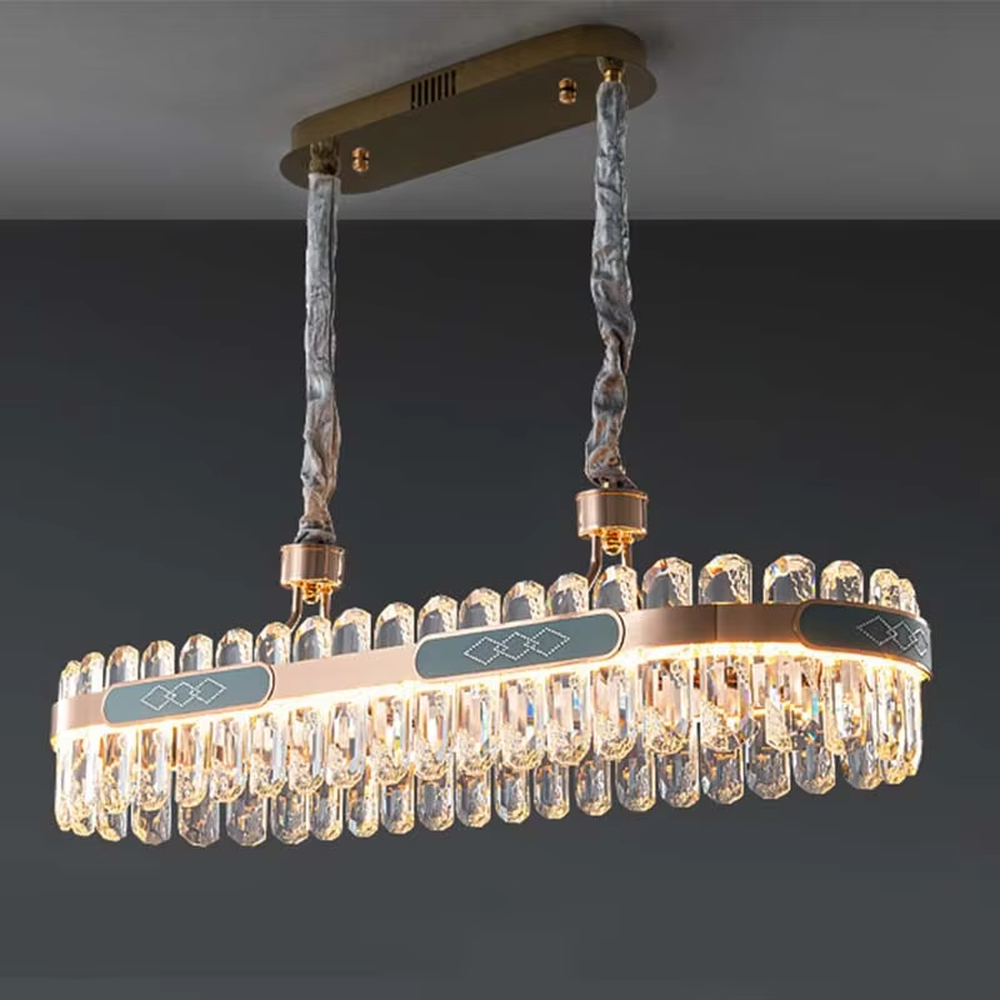 Light luxury circular crystal chandelier, golden metal frame paired with transparent crystals and blue-green decorative blocks, brilliant and gorgeous lighting, creating a high-end light luxury atmosphere.