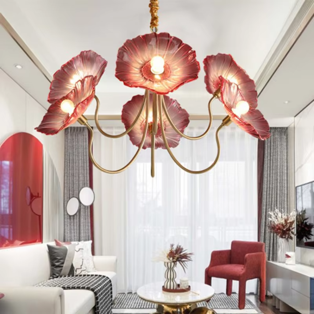 This is an artistic flower-shaped chandelier with a golden metal frame and red glass flower lampshades, featuring a retro luxury design with strong artistic sense. It is used for space lighting and decoration, creating an artistic luxury atmosphere. It is suitable for luxury-style home living rooms, art restaurants, soft decoration display spaces and other places.