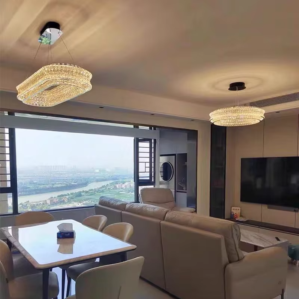 This is a light luxury and luxurious double-layer ring crystal chandelier, with a double-layer ring shape full of crystals. When lit, the light is brilliant and gorgeous, creating a high-end luxurious atmosphere.