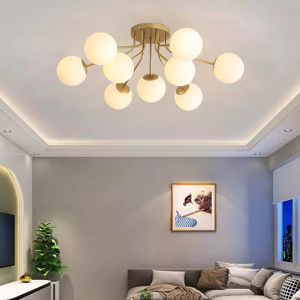 This is a Nordic modern luxury spherical ceiling light, with a golden metal branched stand and multiple white spherical frosted lampshades, featuring a minimalist modern design and strong luxury sense. It is used for space lighting and decoration, creating a warm modern luxury atmosphere. It is suitable for modern luxury home living rooms, Nordic-style bedrooms, designer studios and other places.