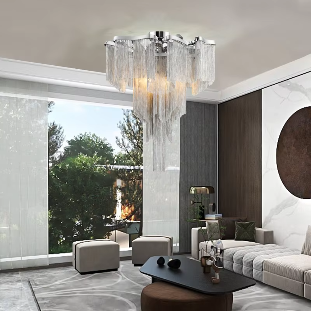 Modern light luxury golden frame light blue crystal tassel layered ceiling chandelier, warm light effect, creating an elegant and exquisite space atmosphere.