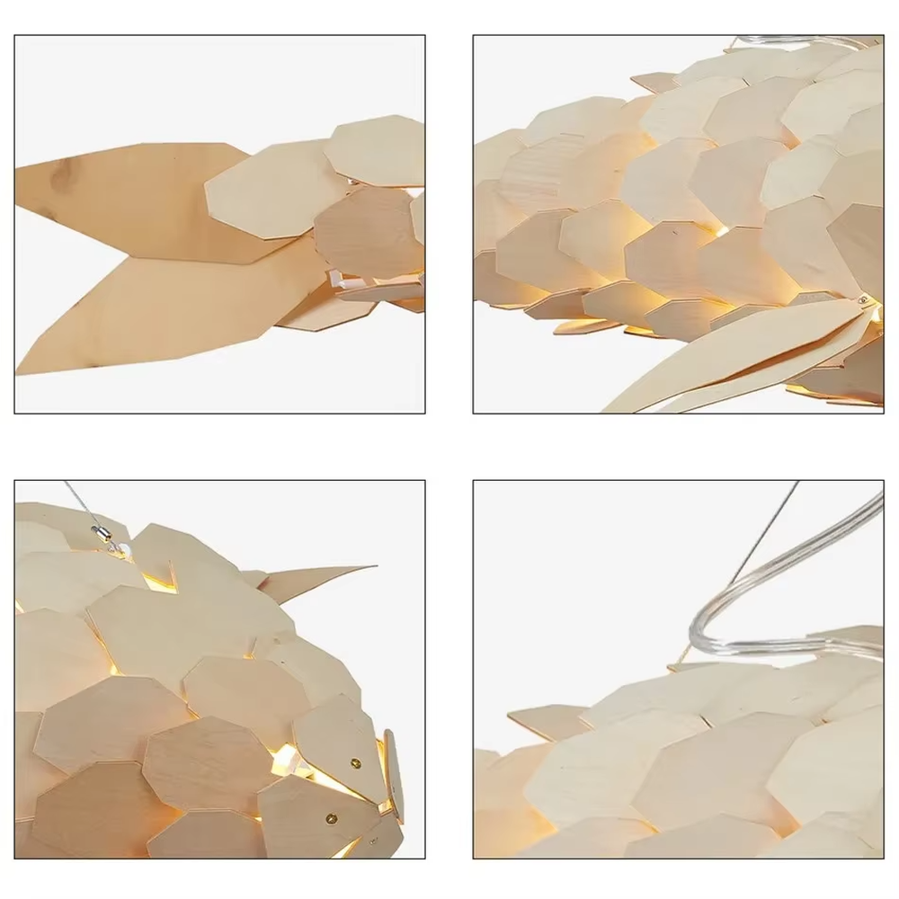 This is an artistic golden fish-shaped chandelier with a golden scale structure in the shape of a fish, featuring a flexible and artistic design. It is used for space lighting and decoration, creating an artistic luxury atmosphere. It is suitable for new Chinese-style home living rooms, creative restaurants, art soft decoration spaces and other places.