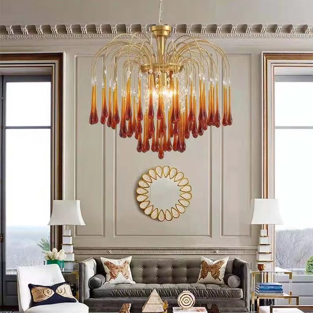 Vintage light luxury golden metal wireframe amber waterdrop glass chandelier, warm light effect, creating a cozy vintage luxurious atmosphere.