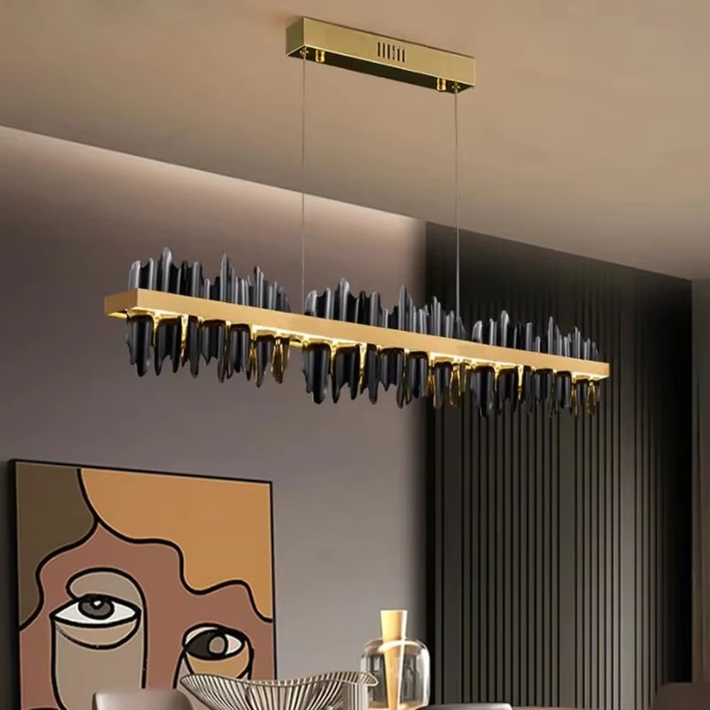 Modern art mountain-shaped black-gold long chandelier, warm light effect, creating a high-quality creative space atmosphere.