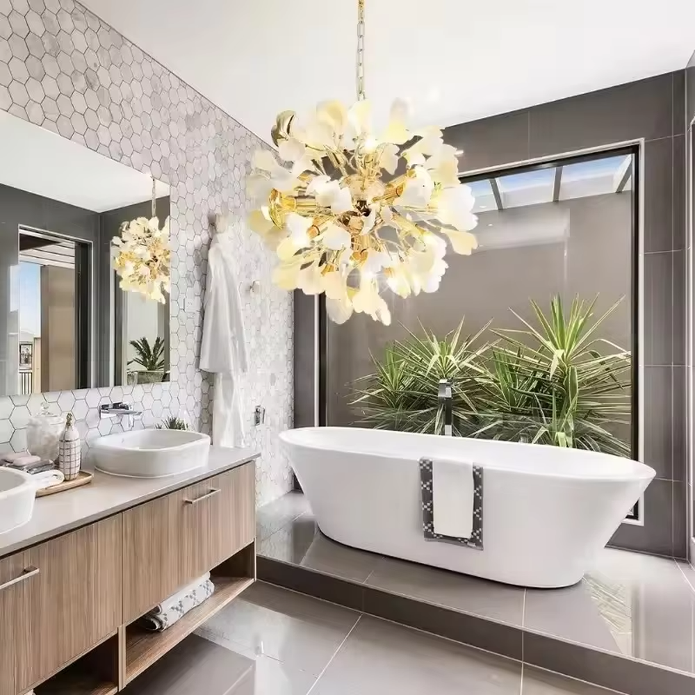 This is an artistic flower-shaped chandelier with a golden metal frame and white petal-shaped lampshades, featuring a fresh and elegant design with strong artistic sense. It is used for space lighting and decoration, creating a luxurious and elegant ambiance. It is suitable for luxury-style home living rooms, art foyers, high-end restaurants and other places.