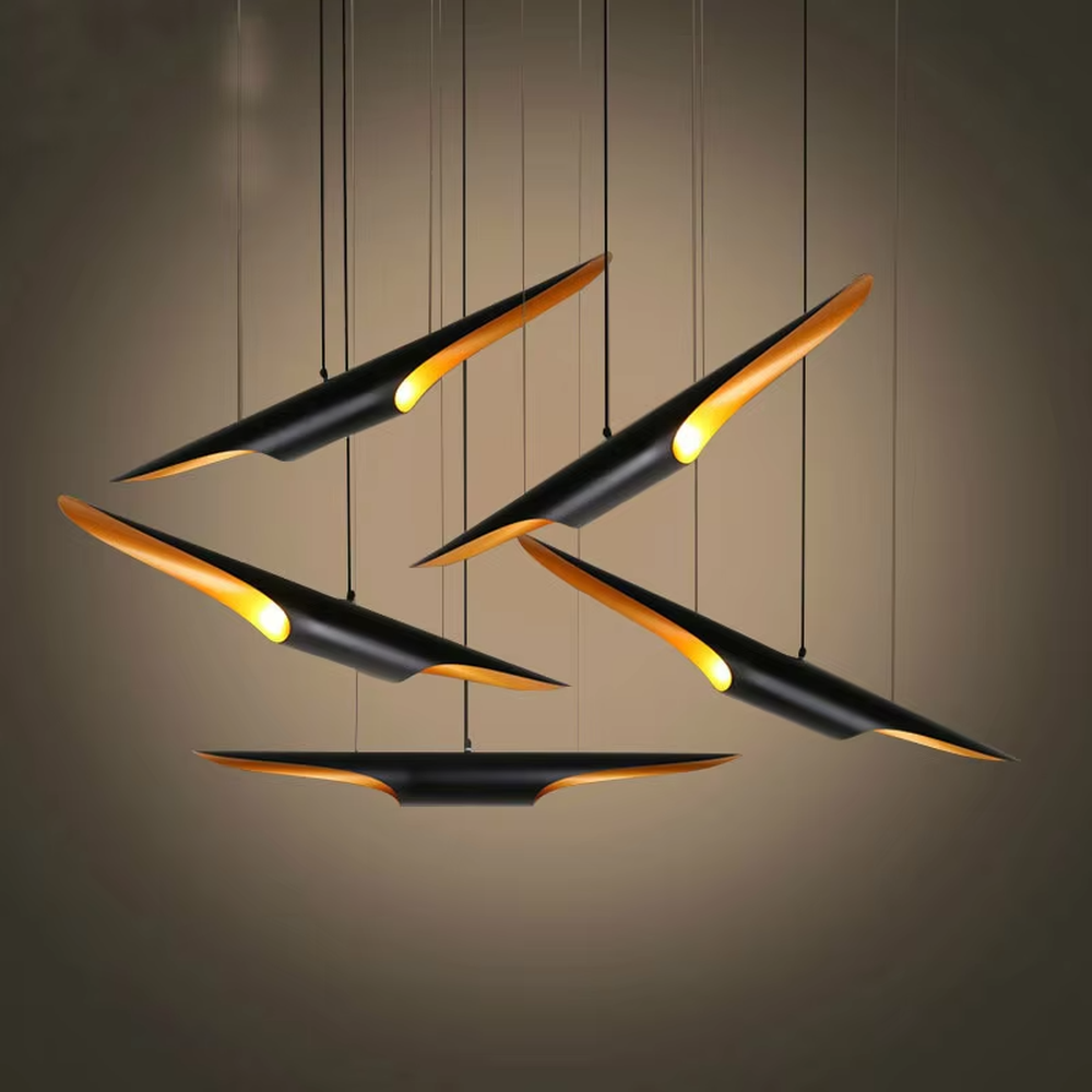 This modern minimalist wing-shaped chandelier features a black metal body with warm light LED strips embedded in the edges, hung in a scattered bird-like shape. It serves both lighting and decorative purposes, ideal for high-ceiling living rooms, light luxury restaurants, high-end office spaces and other scenarios.
