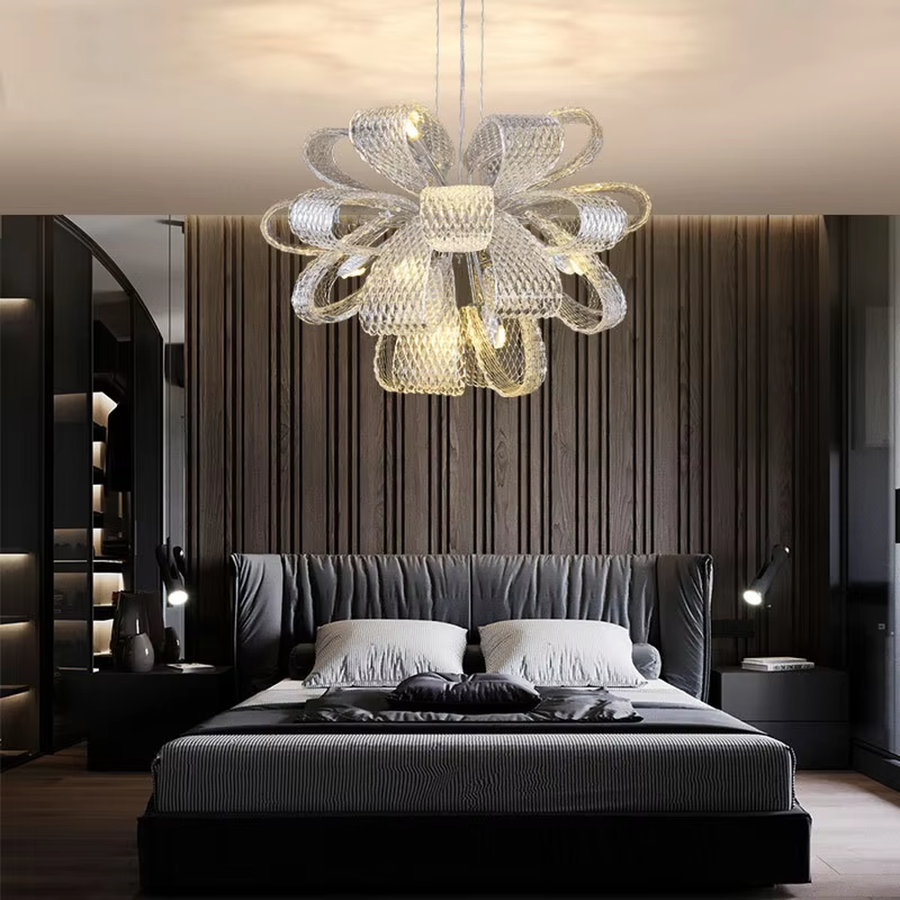 Modern art flower-shaped textured transparent light luxury chandelier, silver-toned frame + warm light effect, creating an artistic light luxury home atmosphere.