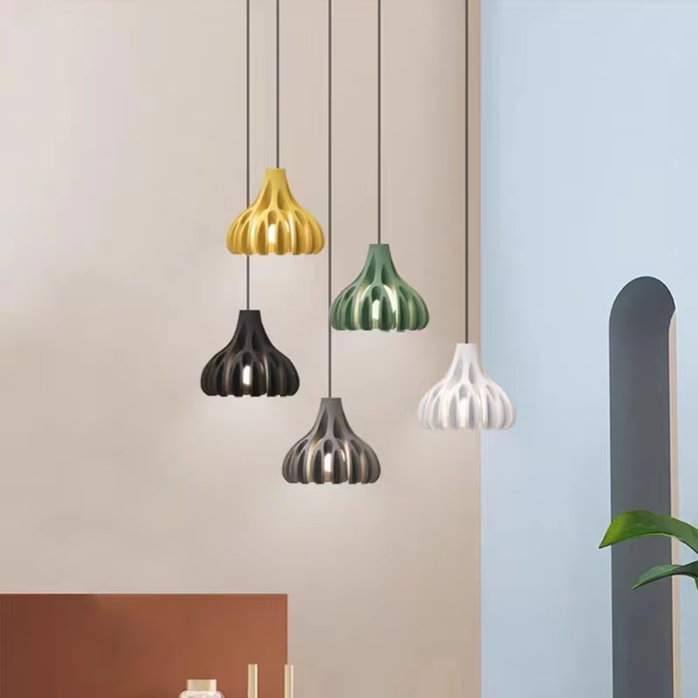 Fresh bud-folded shape multi-color hanging chandelier, bright colors like yellow/green + fan-folded lampshade + black suspension rope, soft warm light, creating a lively and fresh home atmosphere.