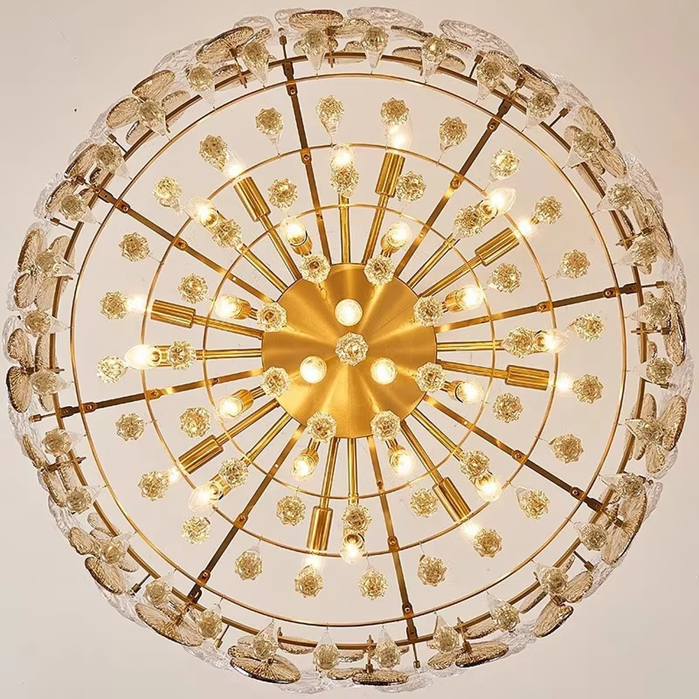 This is a light luxury and luxurious disc crystal chandelier, with a golden metal frame paired with multi-layer disc-shaped crystals and crystal pendants. It features an exquisite and grand design, with brilliant and soft lighting. It is used for space lighting and decoration, creating a light luxury and luxurious atmosphere. Suitable for light luxury-style dining rooms, luxury living rooms, high-end hotel banquet halls and other places.
