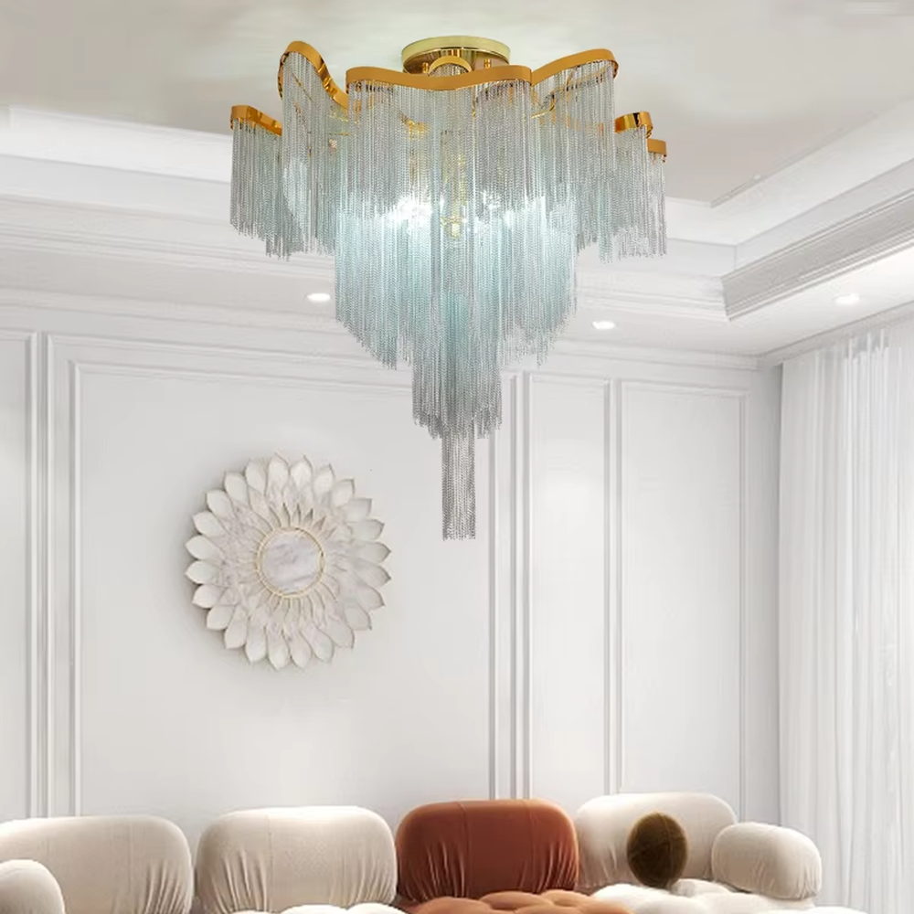 Modern light luxury golden frame light blue crystal tassel layered ceiling chandelier, warm light effect, creating an elegant and exquisite space atmosphere.