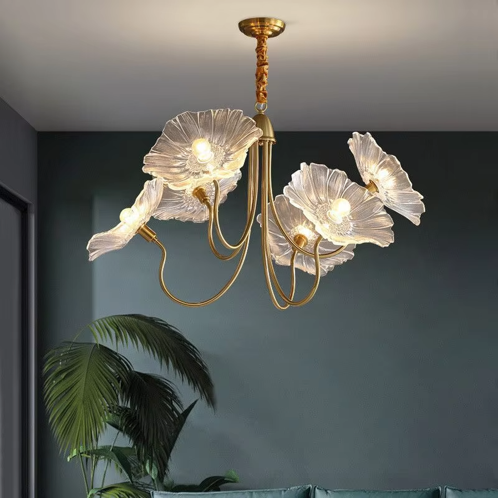 This is an artistic flower-shaped chandelier with a golden metal frame and red glass flower lampshades, featuring a retro luxury design with strong artistic sense. It is used for space lighting and decoration, creating an artistic luxury atmosphere. It is suitable for luxury-style home living rooms, art restaurants, soft decoration display spaces and other places.