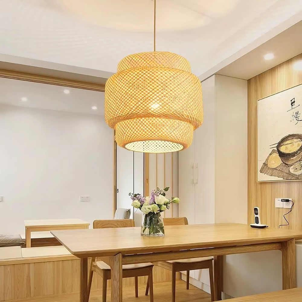 This is a multi-layered rattan round chandelier, woven from natural rattan, with a simple and layered design, exuding a natural pastoral atmosphere. It is used for space lighting and decoration, creating a warm and natural ambiance. It is suitable for Nordic-style home living rooms, homestay guest rooms, pastoral-style restaurants, casual cafes and other places.