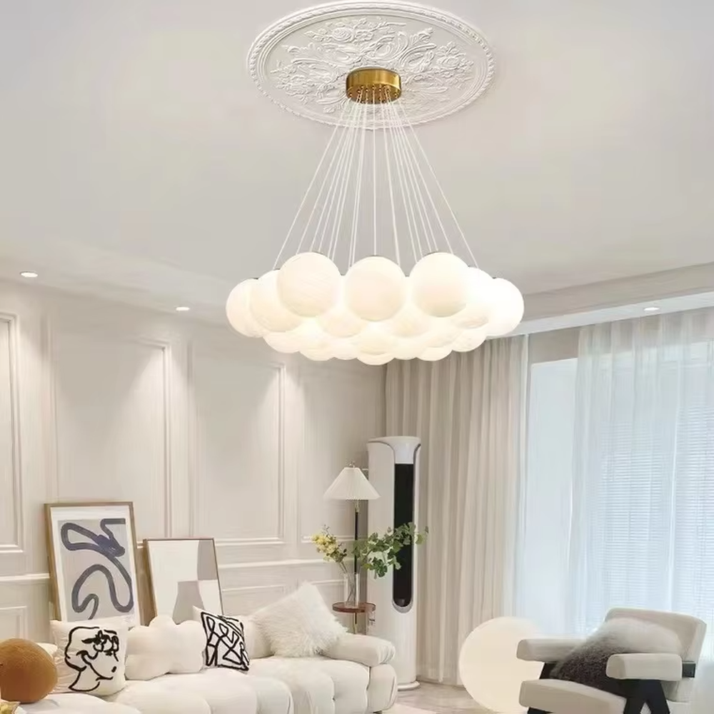 Light luxury cloud cluster glass ball chandelier (milk-white glass balls + gold wire frame), warm light effect, creating a soft and healing light luxury space atmosphere.