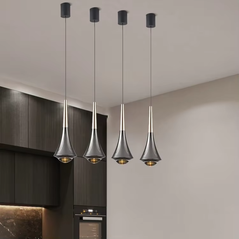 This minimalist light luxury conical small chandelier features a water-drop shape made of black-gold metal, with a thin gold rod on top, projecting soft light spots, serving both lighting and decorative purposes, ideal for bedroom bedside tables, dining bars, light luxury commercial spaces and other scenarios.