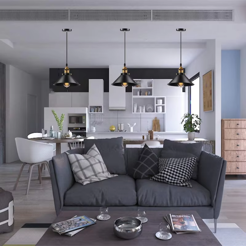 Industrial style black-gold three-head cone chandelier, with black iron lampshades and gold metal top details, embedded with retro Edison bulbs, providing warm and atmospheric light, used for lighting and decoration in dining tables, bars and other areas, suitable for industrial, modern minimalist home and commercial spaces