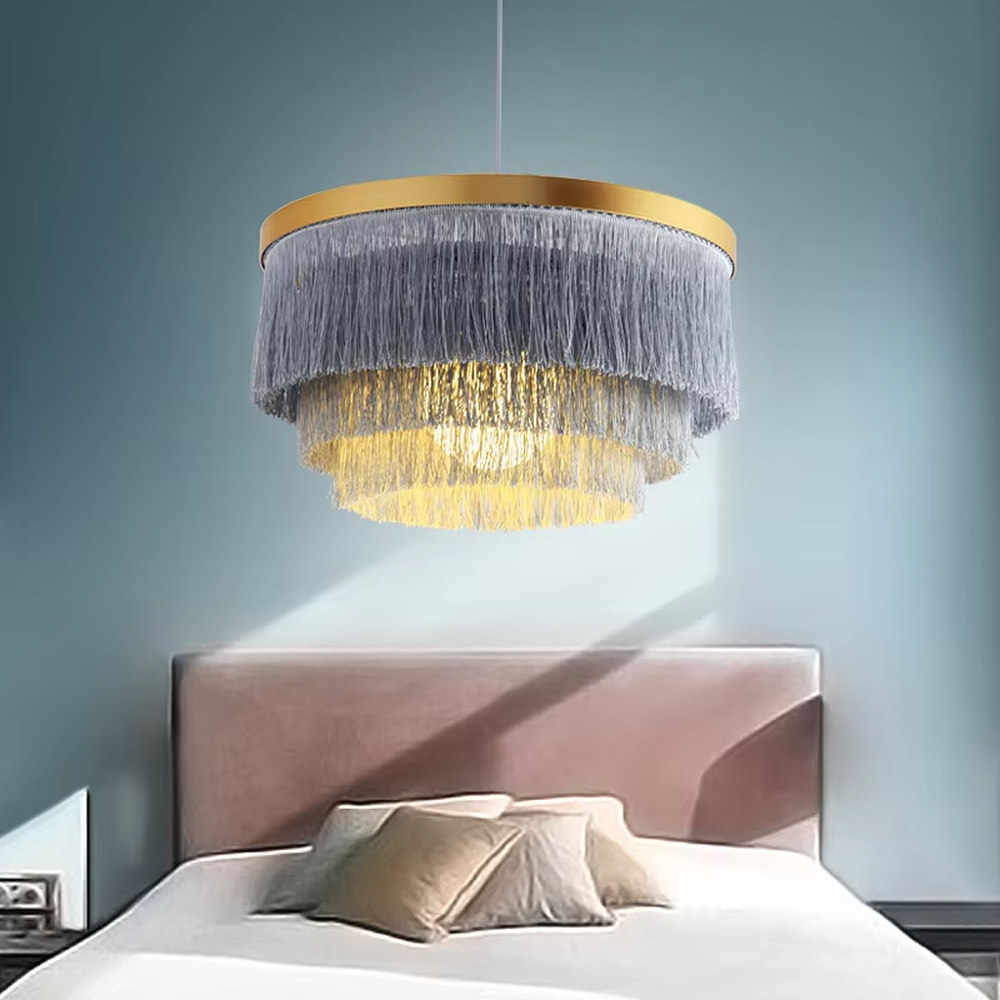 Light luxury gradient pink tassel multi-layer circular chandelier (gold trim decoration), warm light effect, creating a romantic and exquisite space atmosphere.