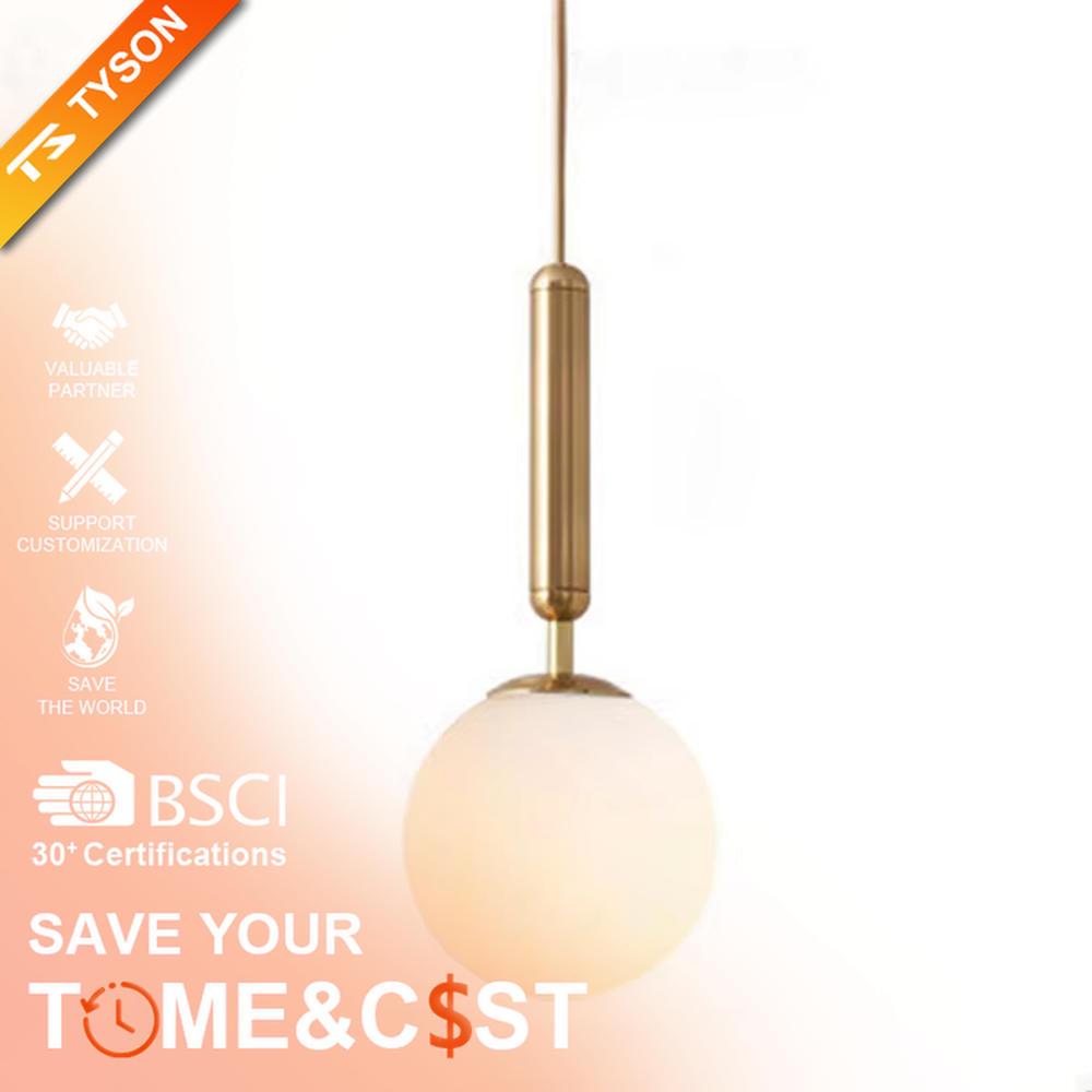Minimalist gold rod glass ball chandelier (gold cylinder hanging rod + milk-white glass ball), warm light effect, creating a simple and high-end space atmosphere.